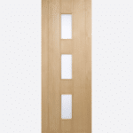 OAK COPENHAGEN GLAZED 3L This Copenhagen door features three frosted double glazed panels and vertical grooved panels, complete in Oak with a dowel construction.