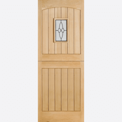 OAK COTTAGE STABLE GLAZED 1L This timeless door design is modelled on cottage stables, featuring a lead double glazed panel, grooved shaped panels and raised moulding.