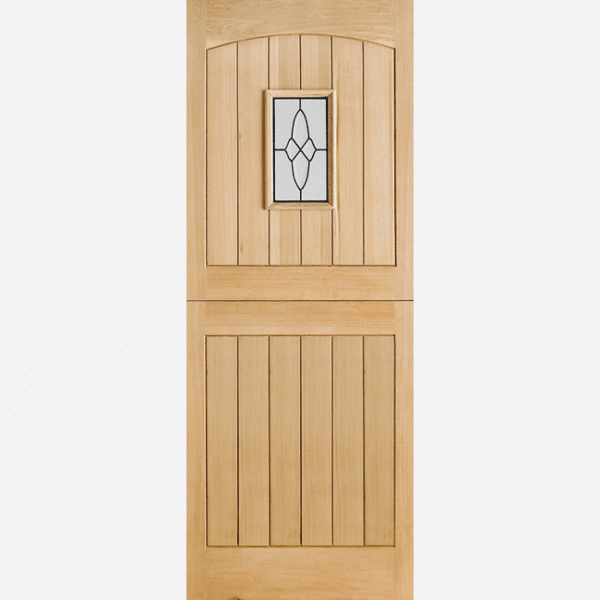 OAK COTTAGE STABLE GLAZED 1L This timeless door design is modelled on cottage stables, featuring a lead double glazed panel, grooved shaped panels and raised moulding.