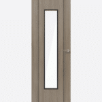 LIGHT GREY LAMINATE MONACO GLAZED In Pre-finished light grey, this laminate internal door is ready to hang. Featuring solid black inlays down the edges which enhances the contemporary look. The vertical clear glazed panel will allow natural light to flow throughout your home, making rooms seem brighter.