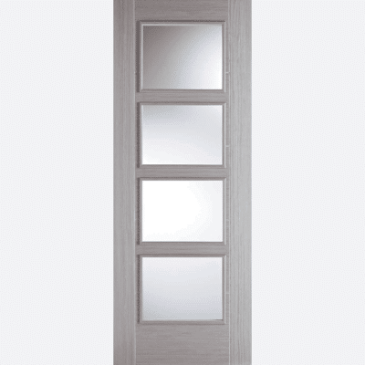 LIGHT GREY VANCOUVER GLAZED 4L BESPOKE SIZES AVAILABLE Four clear glazed panels are framed in a tasteful pre-finished Light Grey shade, with raised moulding on both sides of this door design.